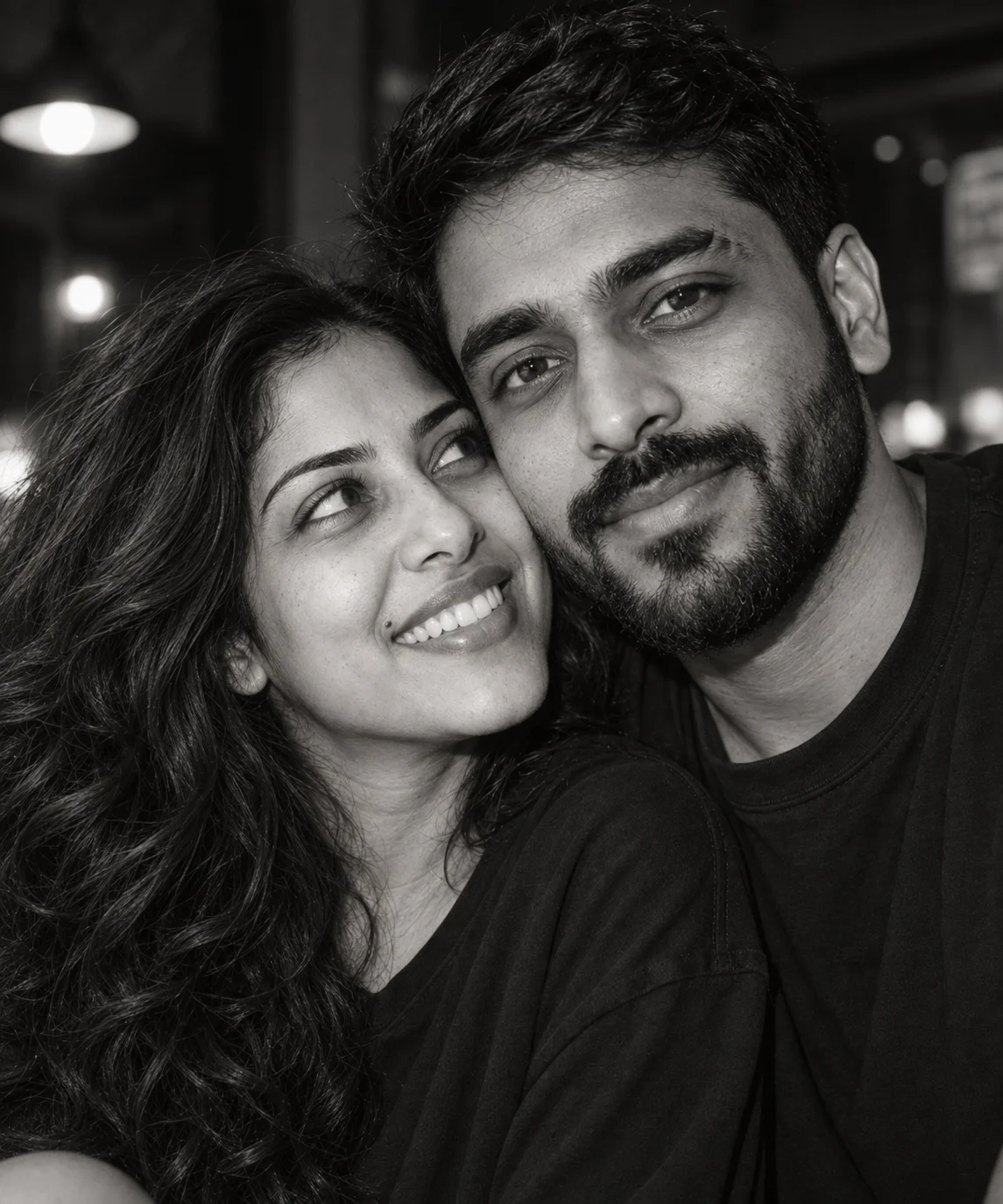 AI-generated example: A black-and-white café portrait. Fictional adult couple.