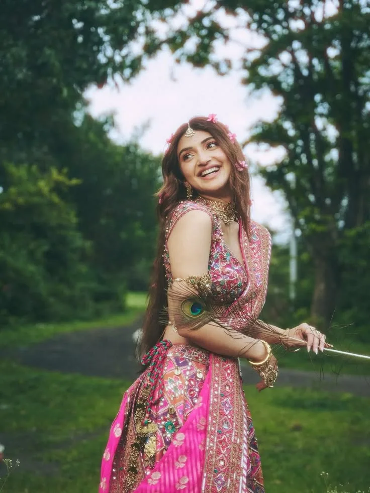 Radha-Inspired Outdoor Portrait of Sreeleela in Pink Lehenga