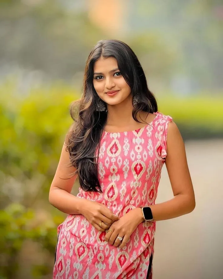 Candid Outdoor Garden Portrait of Indian Woman in Pink Ikat Kurti