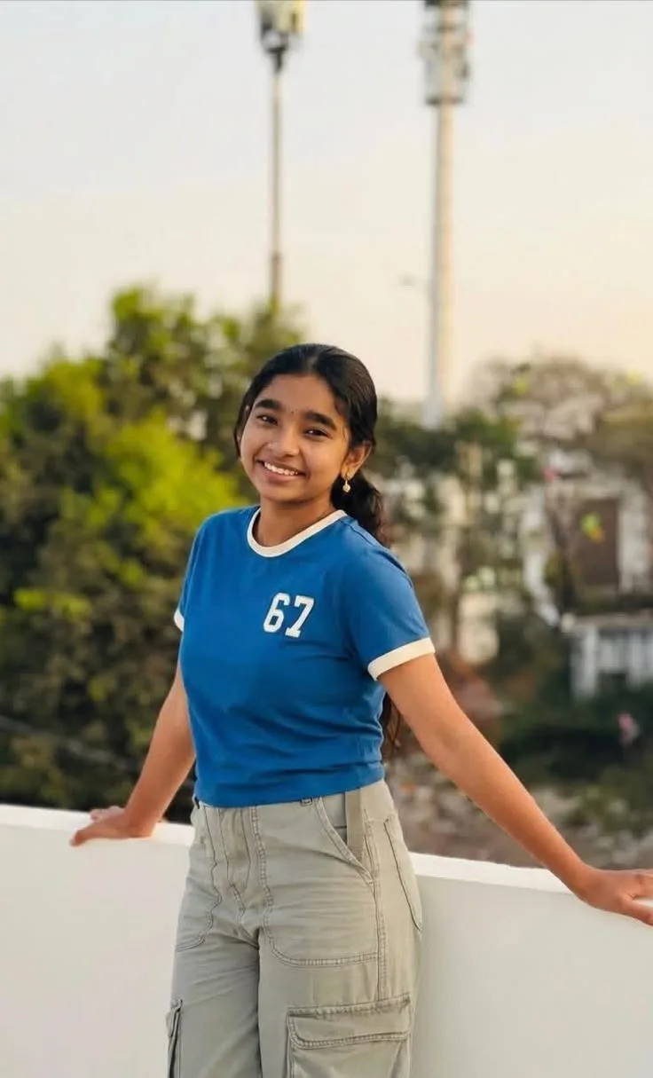 Candid Rooftop Sunset Portrait of Young Woman in Blue Ringer Tee