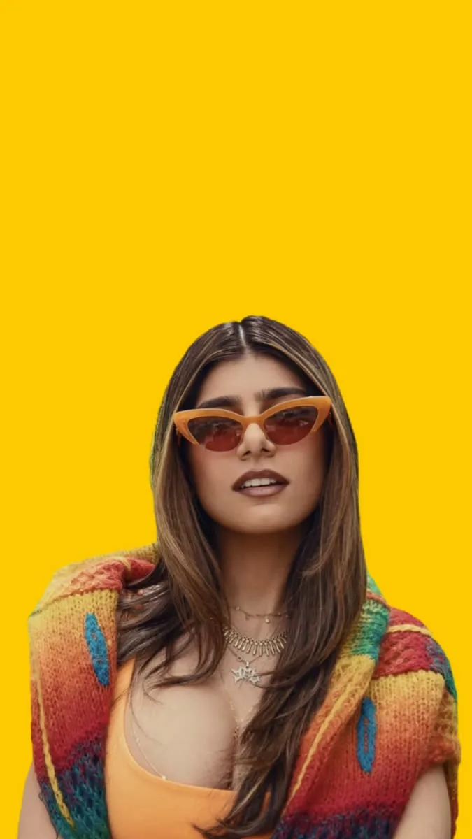 Chic Pop Art Female Studio Portrait with Cat-Eye Sunglasses & Yellow Backdrop Prompt