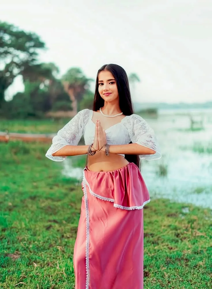 Outdoor Portrait of Young South Asian Woman in Traditional Attire by the Lakeside