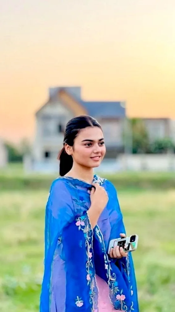 Candid Outdoor Sunset Portrait of Young Woman in Royal Blue Dupatta