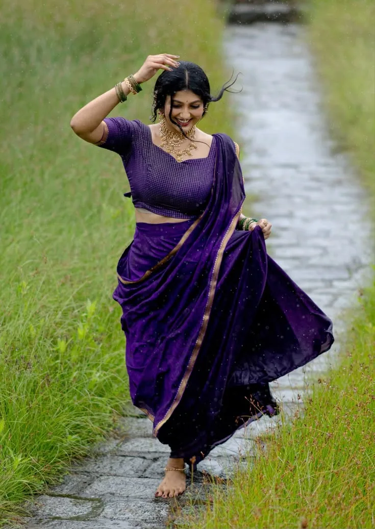 Traditional Purple Saree Outdoor Candid, Radiant Rainy Path Ethnic Elegance, Joyful Barefoot Half Saree Countryside Aest