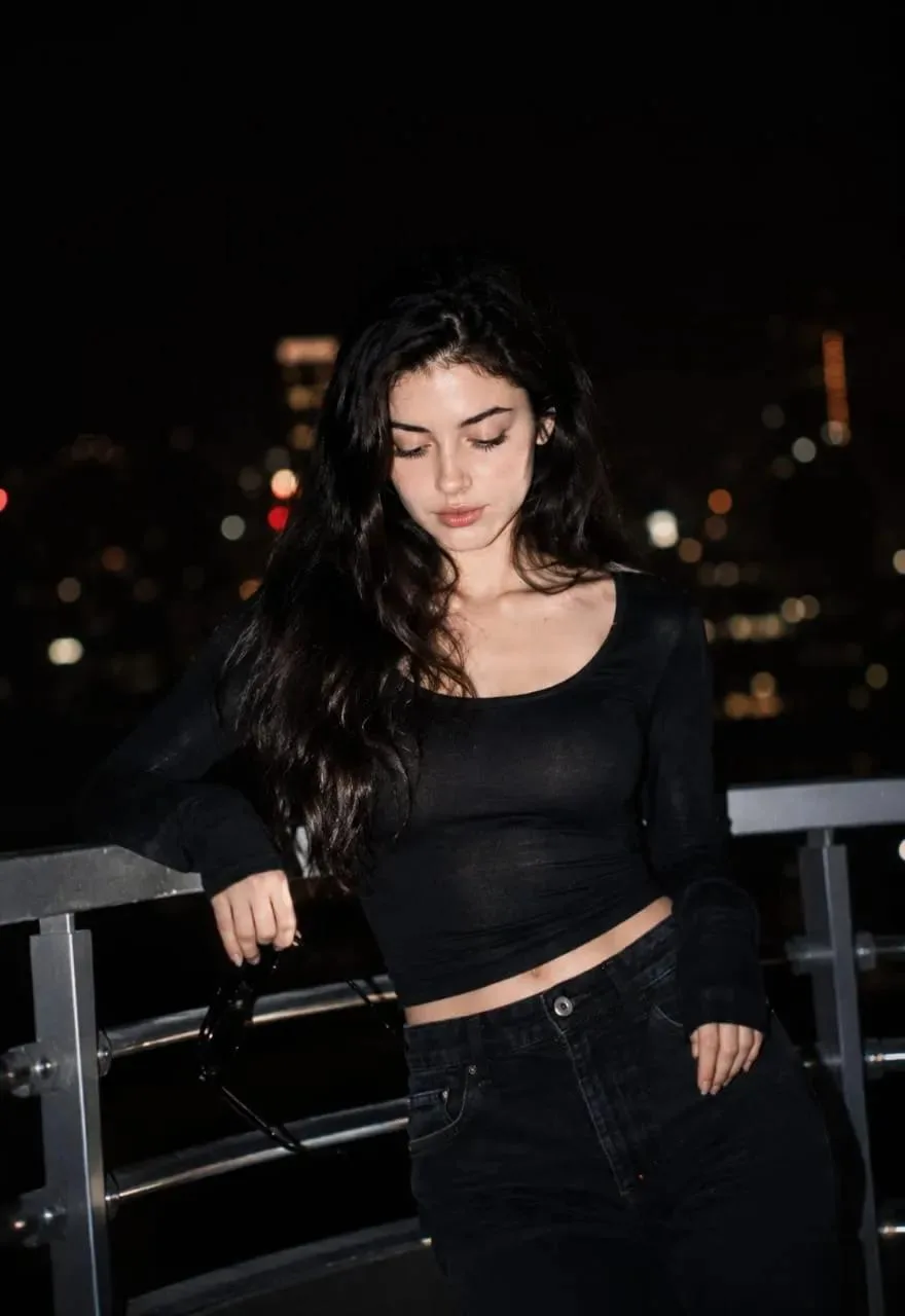 Cinematic Ultra-realistic night portrait of a young woman