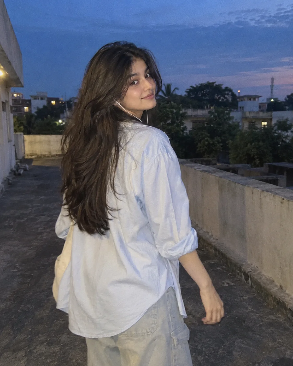 Ultra realistic cinematic portrait of a young girl on a rooftop
