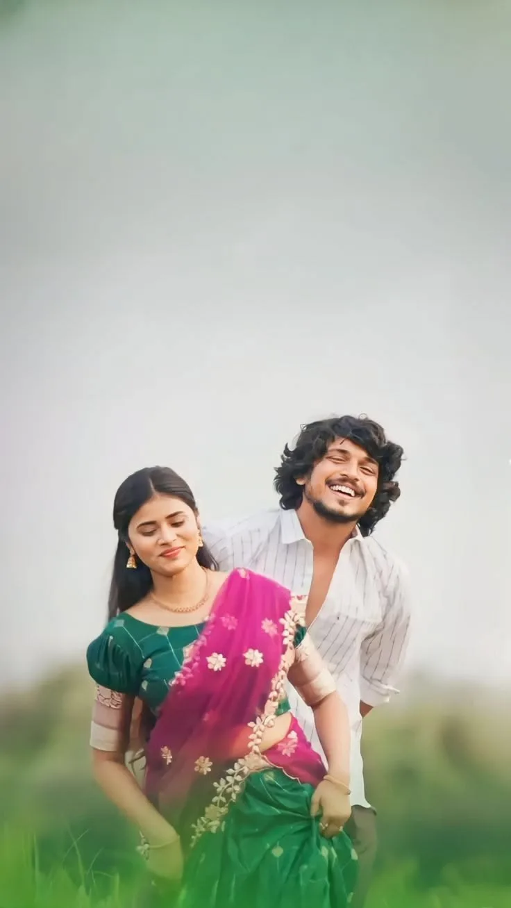 Joyful Outdoor Candid Couple Portrait in Traditional Attire
