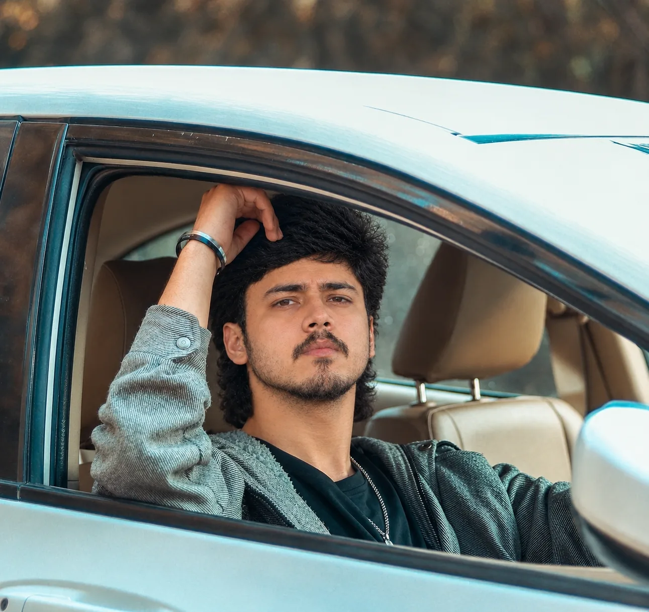 Cinematic Car Window Portrait – Realistic Male Lifestyle Photography