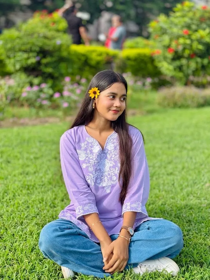 Serene Female Portrait Sitting on Lawn in Lavender Chikankari Kurti Prompt