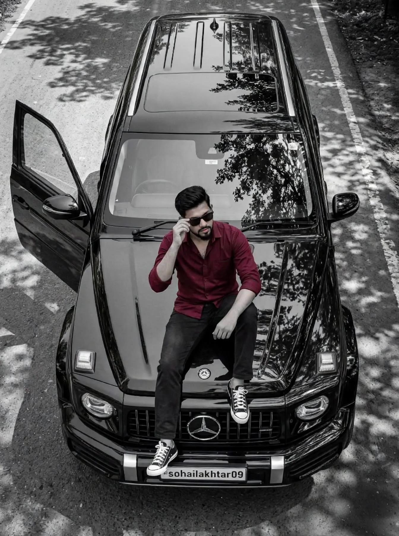 Black SUV Top-Down Portrait, Maroon Shirt Selective Color