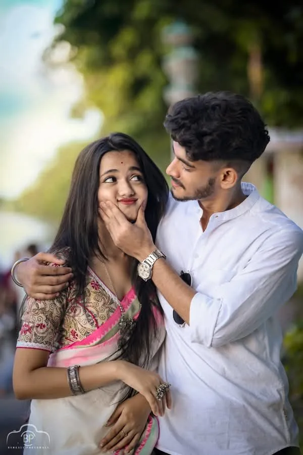 Playful Candid Couple Portrait in Traditional Attire