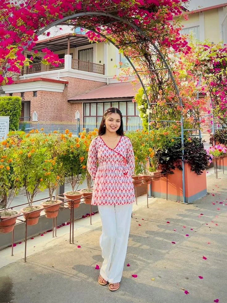 Bright Garden Portrait Under Bougainvillea Arch