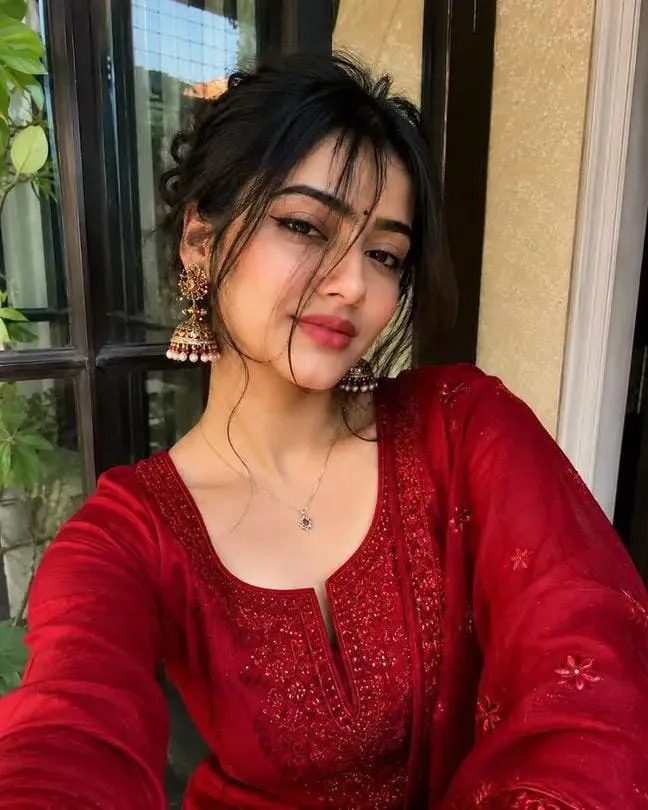 Elegant Portrait of a Beautiful Girl in Red Ethnic Attire