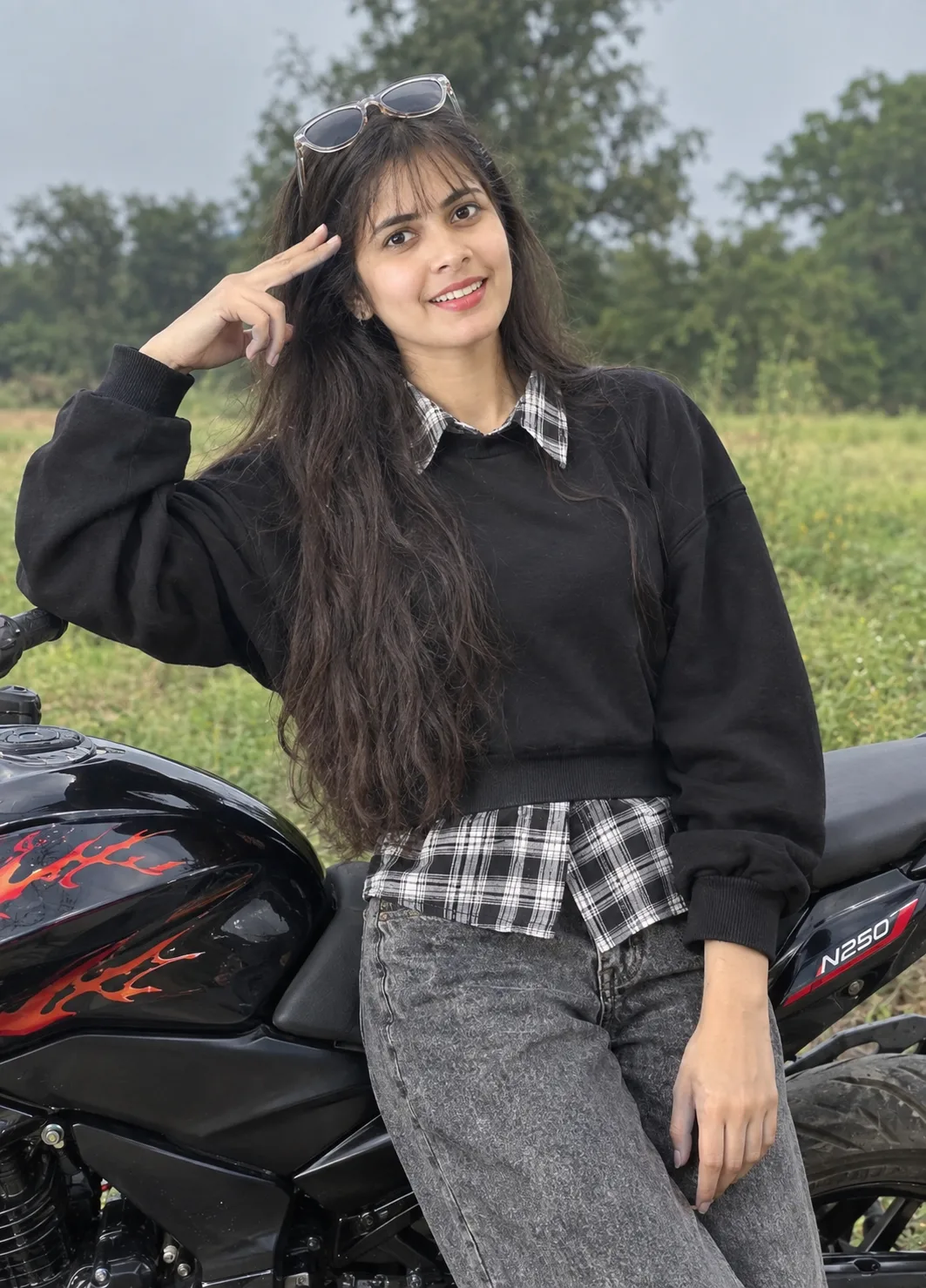 Cheerful Biker Female Portrait Saluting by Pulsar N250 Motorcycle Prompt