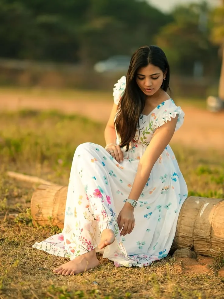 Candid Female Golden Hour Portrait in Ruffled Floral Sundress on Fallen Log Prompt