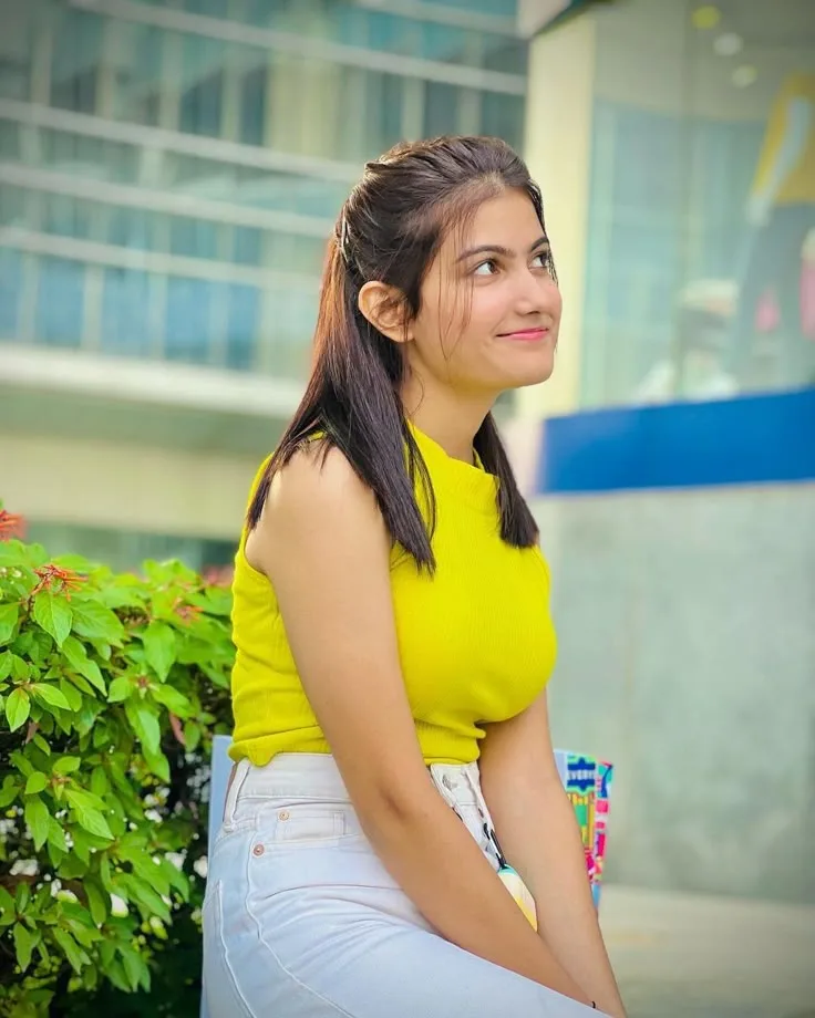 Candid Street-Style Portrait of a Smiling Young Woman