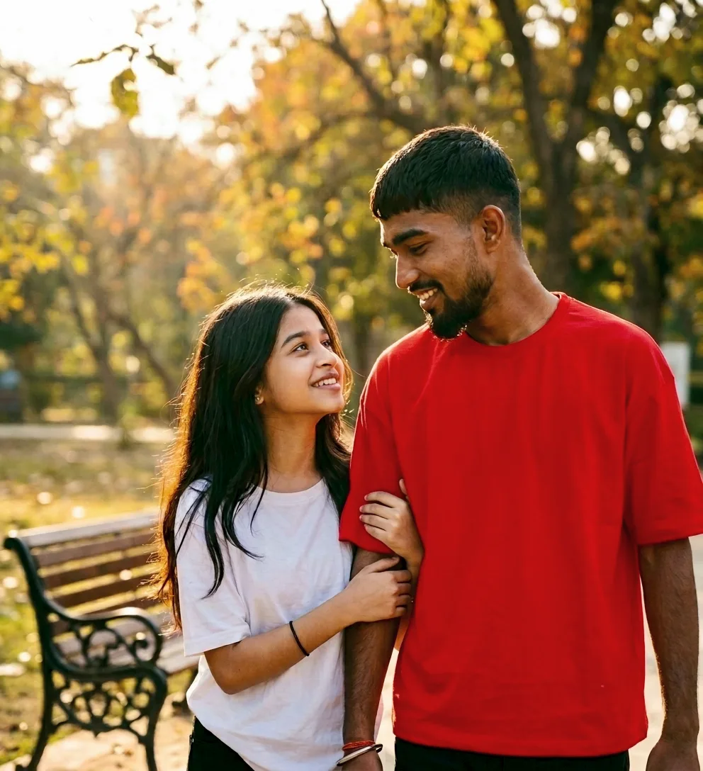 Candid Golden Hour Outdoor Portrait of Young Couple in Park and Overlook