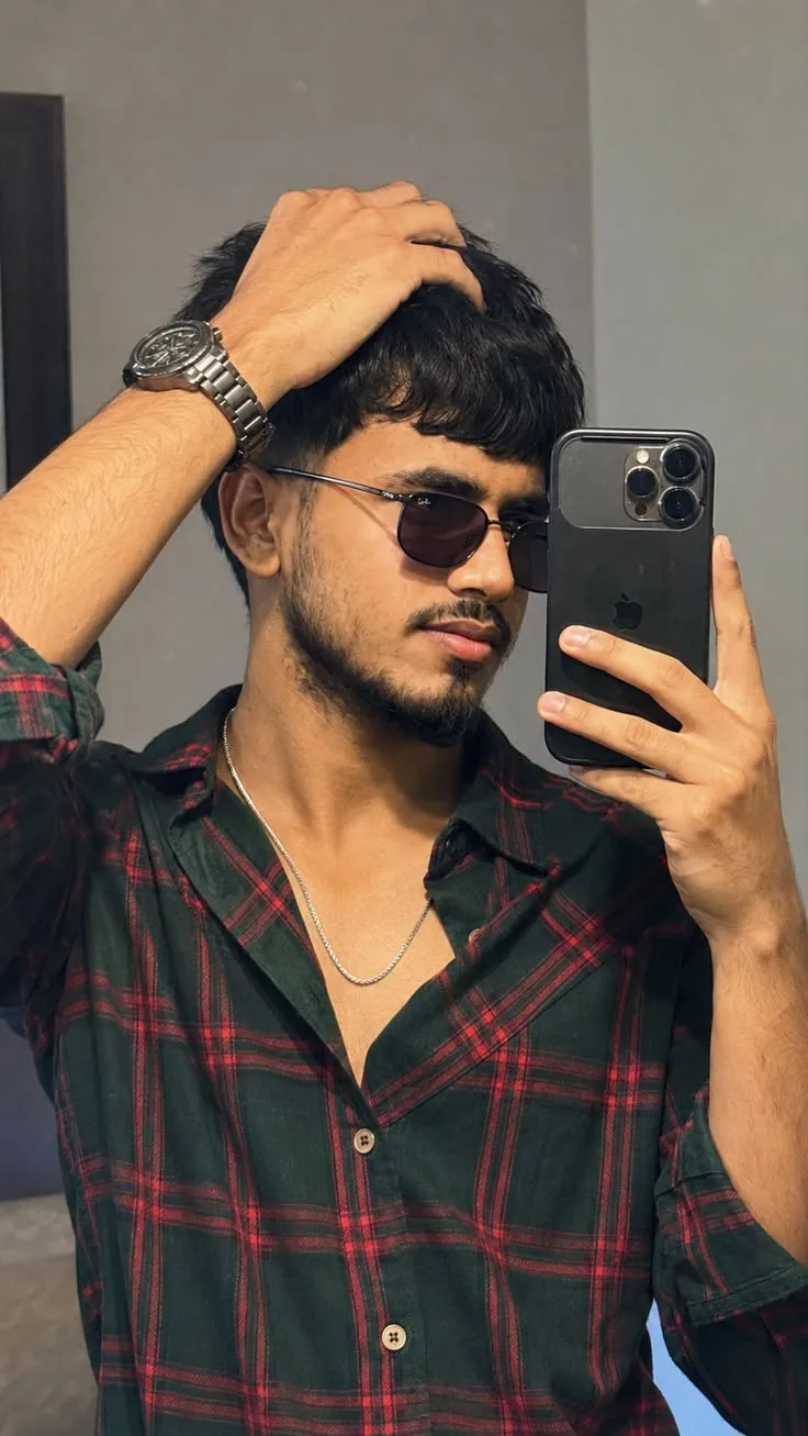 Candid Indoor Mirror Selfie of Young Man in Plaid Shirt