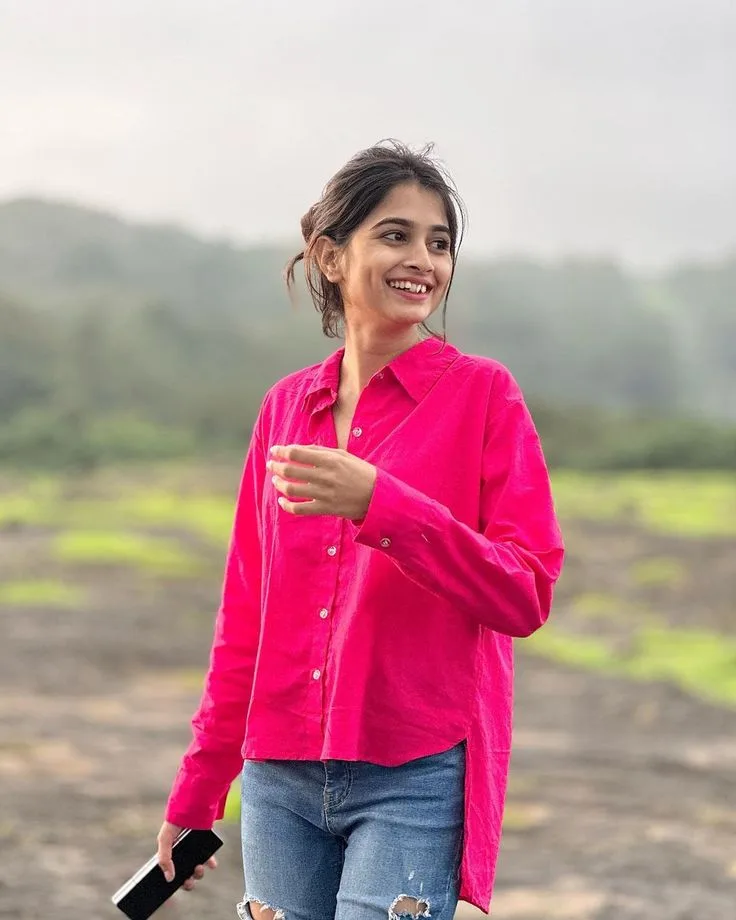 Candid Female Portrait in Vibrant Hot Pink Shirt against Misty Hills Prompt