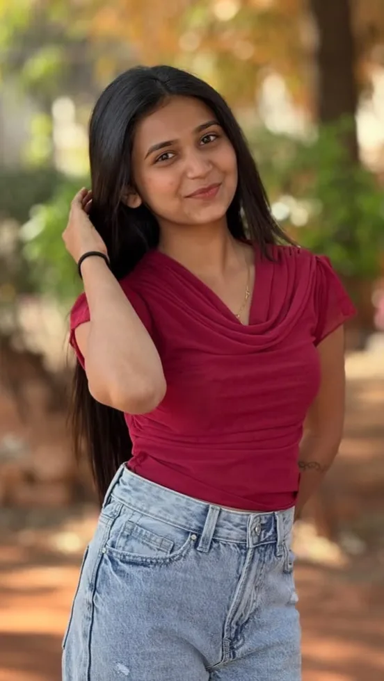 Candid Outdoor Park Portrait of Young Woman in Crimson Cowl-Neck Top