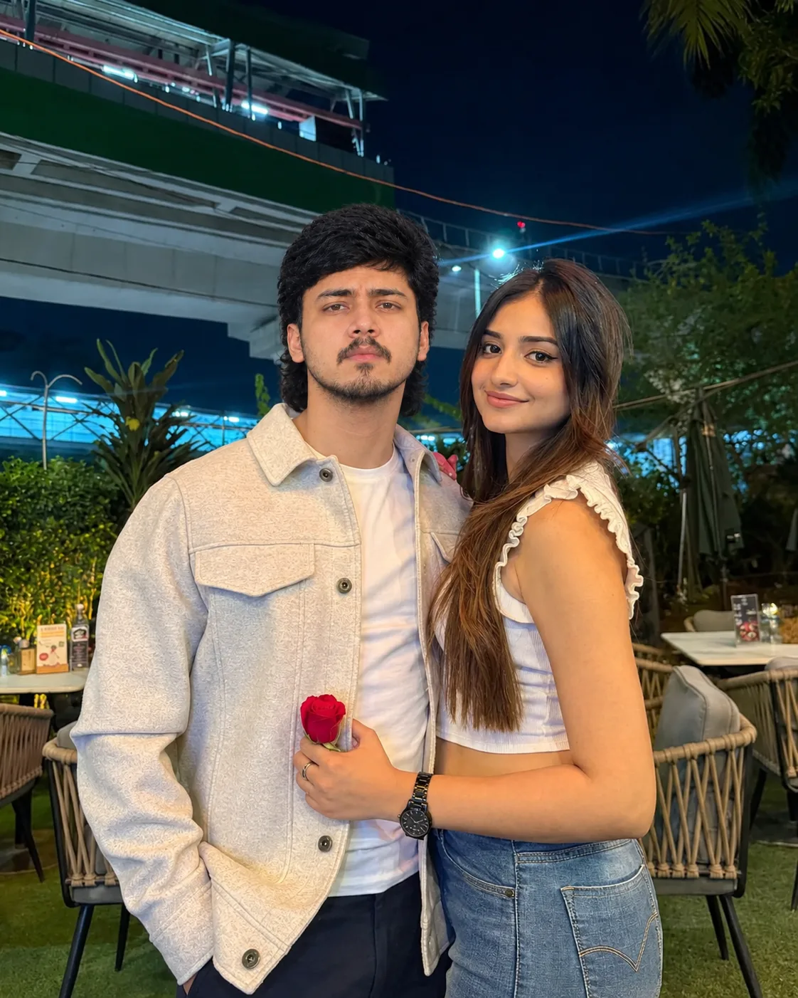 Romantic Night Date – Couple Portrait with a Red Rose
