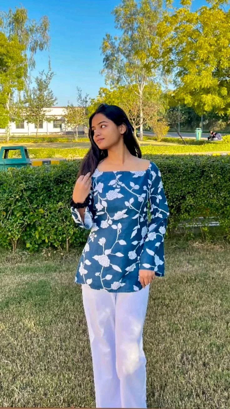 Candid Outdoor Park Portrait of Young Indian Woman in Teal Floral Top