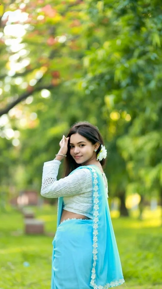 Candid Outdoor Portrait in Sky Blue Saree and White Blouse