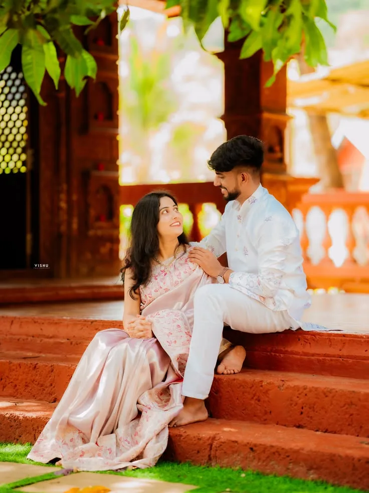 Candid Traditional Pre-Wedding Portrait of Couple on Temple Steps