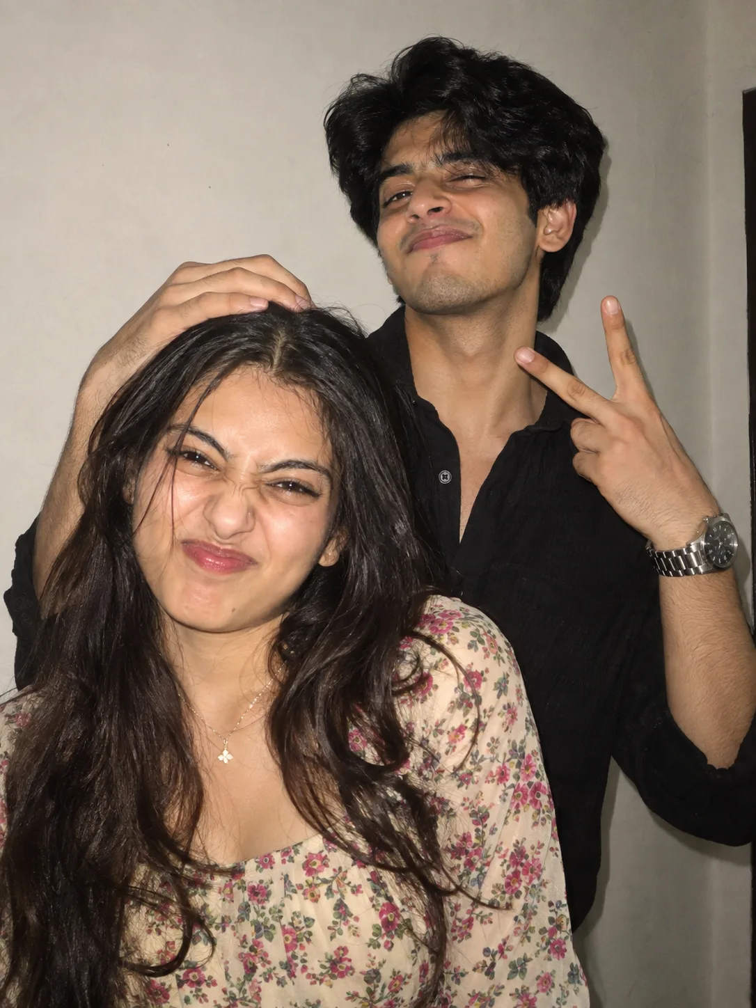 Ultra realistic candid indor photoshoot of a playful young Couple