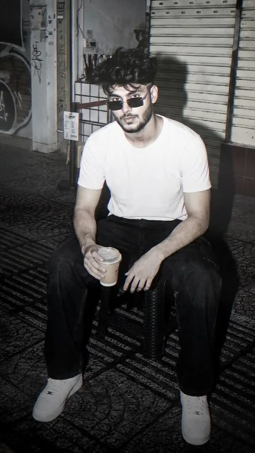 Candid Night Flash Portrait of Young Man on Urban Street