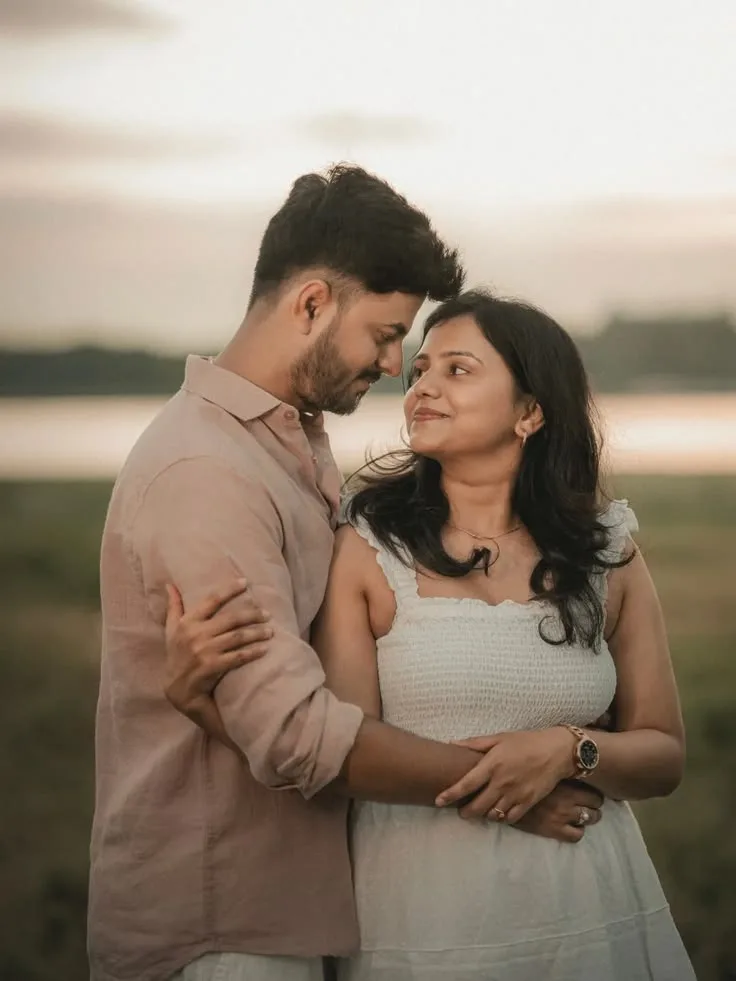 Romantic Golden Hour Outdoor Portrait of Young Couple by the Lake