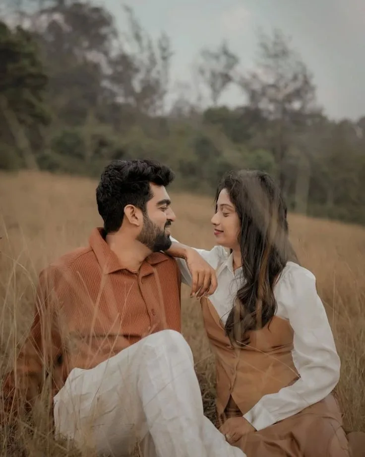 Romantic Autumn Meadow Pre-Wedding Portrait of Young Indian Couple