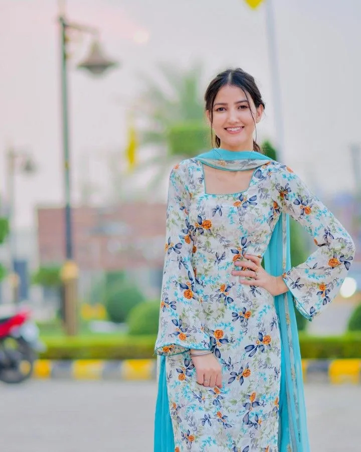 Candid Outdoor Street Portrait of Young Woman in Floral Salwar Suit