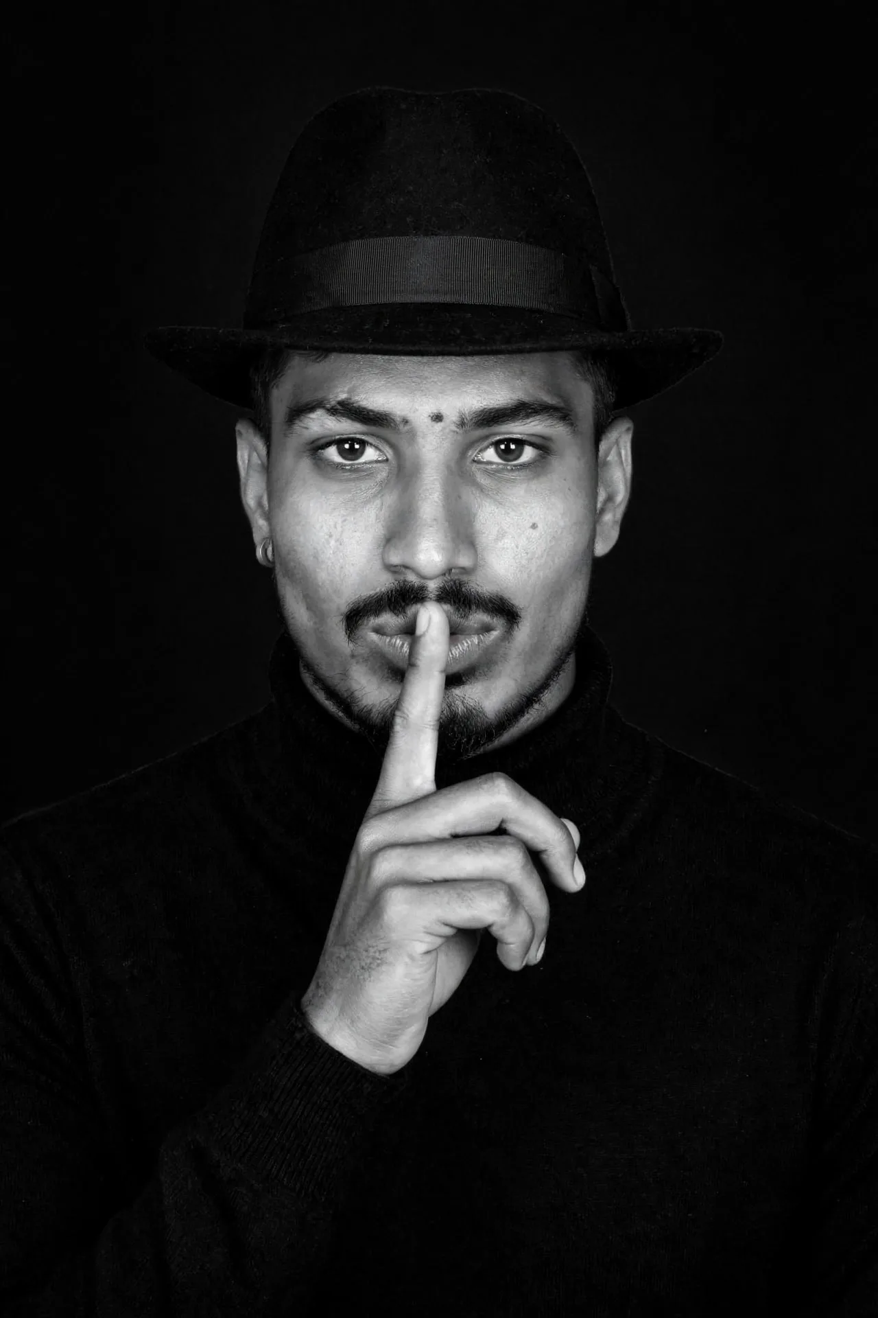 Here is your black & white fine art portrait — face preserved exactly, only style/pose