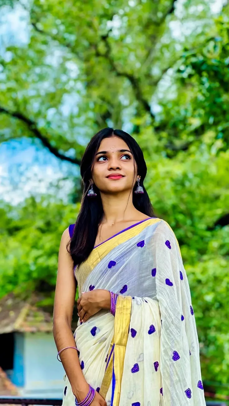 Candid Upward Gaze Portrait in Traditional Kerala Saree