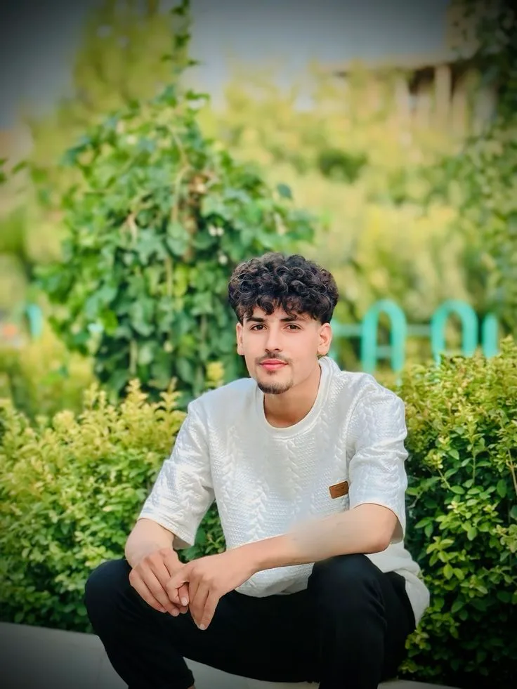 Candid Garden Portrait of Young Man in Textured White Shirt