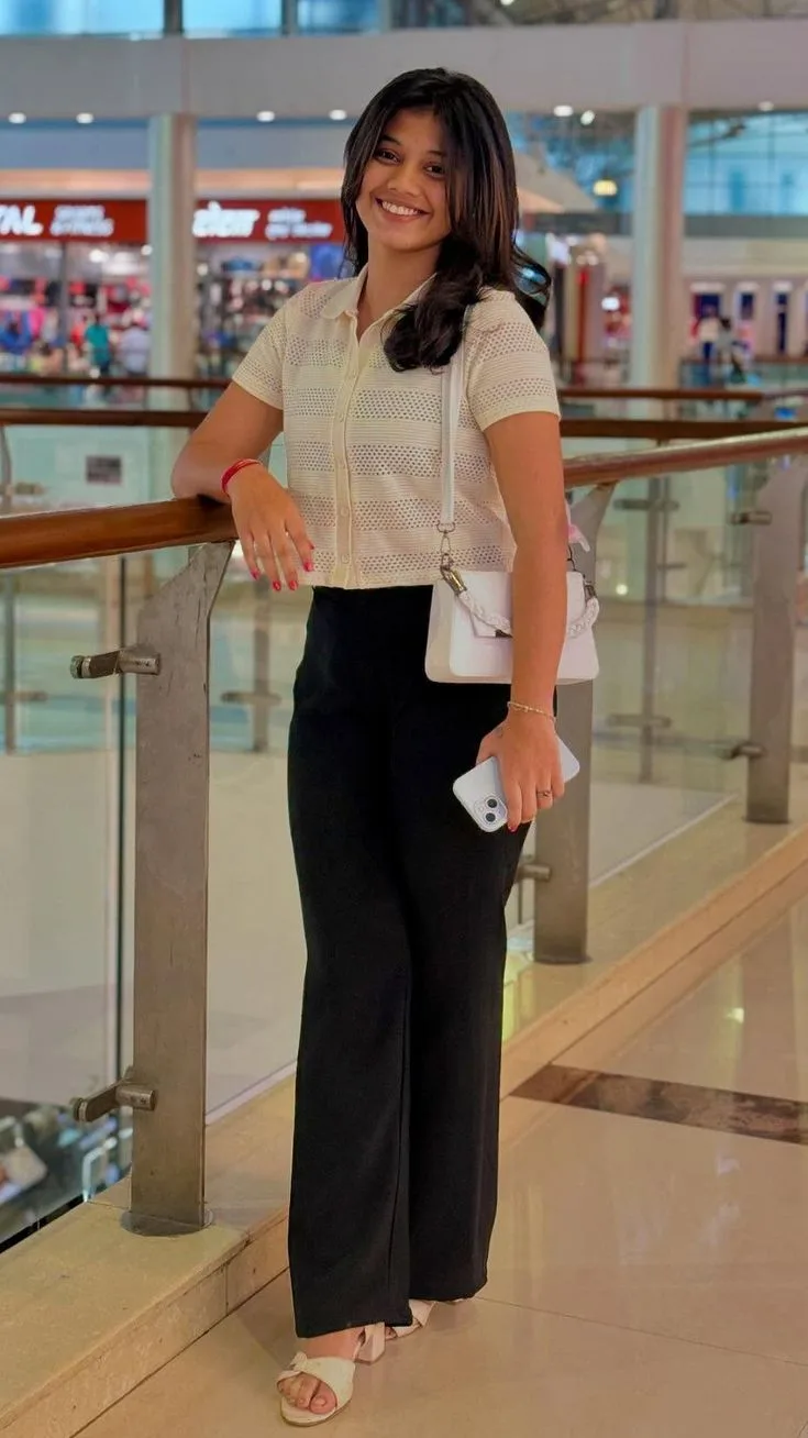 Elegant Female Shopping Mall Portrait Leaning on Glass Railing Prompt