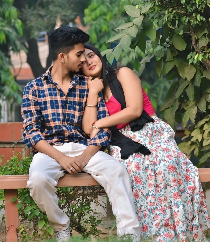 Candid Outdoor Park Portrait of Young Couple on Bench