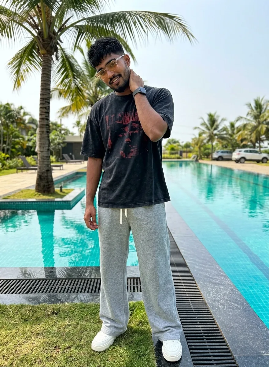 Poolside Male Resort Portrait in Acid-Wash Graphic Tee & Grey Sweatpants Prompt